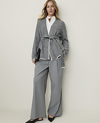 A woman in a gray cardigan and wide-leg pants stands against a plain, light-colored background. carousel Product Image 3