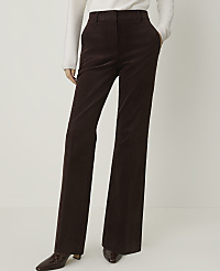 A person in brown corduroy pants and a white sweater stands against a plain white background. carousel Product Image 2