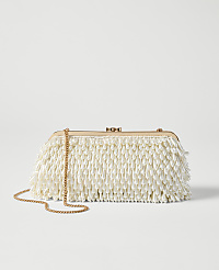 A beaded clutch with a gold chain rests on a plain, light gray background. carousel Product Image 1