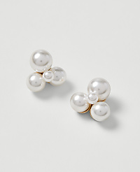 A cluster of pearl earrings rests on a plain white background. carousel Product Image 1