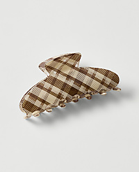 A brown and cream checkered hair claw sits on a plain white background. carousel Product Image 1