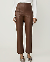 A person stands in brown leather pants and patterned flats against a plain white background. carousel Product Image 2