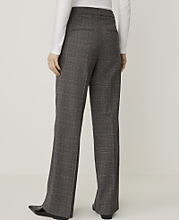 A person wearing plaid trousers stands against a plain white background. carousel Product Image 3
