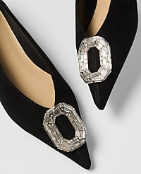 Black pointed-toe heels with ornate crystal embellishments are displayed against a plain white background. carousel Product Image 1
