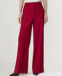 A person in bright red wide-leg trousers stands against a plain white background. carousel Product Image 1