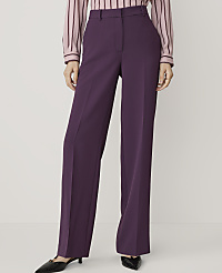 A person in purple wide-leg trousers and a striped top stands against a plain white background. carousel Product Image 1