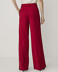 A person wearing red wide-leg pants stands against a plain white background. carousel Product Image 3
