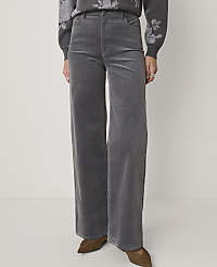 A person stands in gray corduroy wide-leg pants and a floral sweater against a plain gray background. carousel Product Image 2