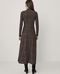 A woman in a brown plaid dress stands against a plain white background. carousel Product Image 2