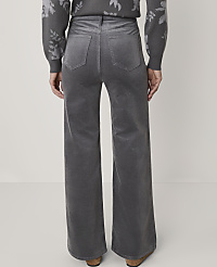 A person wearing gray corduroy wide-leg pants and a patterned sweater stands against a plain white background. carousel Product Image 3