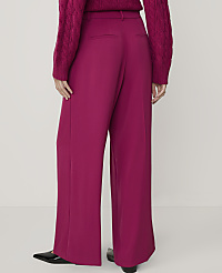 A person wearing a magenta sweater and matching wide-leg pants stands against a plain white background. carousel Product Image 3