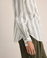 A person in a striped shirt and green pants stands against a plain, light-colored background. carousel Product Image 3