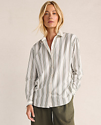 A woman in a striped button-down shirt and green pants stands against a plain, light-colored background. carousel Product Image 1