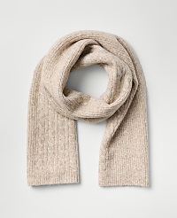 A beige ribbed knit scarf is draped in a loop against a plain light gray background. carousel Product Image 1