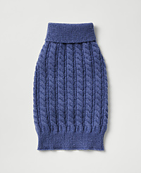 A blue cable-knit sweater for a pet is centered against a plain, light gray background. carousel Product Image 2