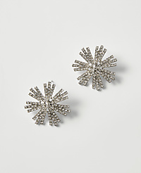 Two starburst-shaped crystal earrings rest on a plain, light gray background. carousel Product Image 1
