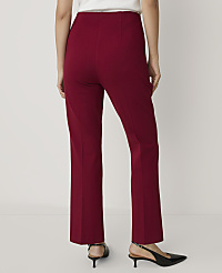 A person wearing red trousers and black heels stands against a plain white background. carousel Product Image 3