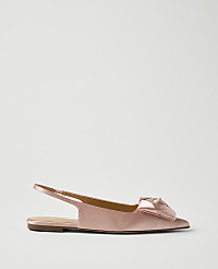 A single pink satin slingback flat with a bow detail sits against a plain light gray background. carousel Product Image 1