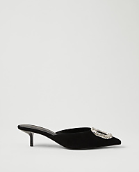 A black velvet pointed-toe mule with a crystal buckle sits against a plain light gray background. carousel Product Image 1
