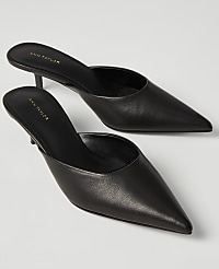 A pair of black pointed-toe Ann Taylor mule heels rests on a plain white background. carousel Product Image 2