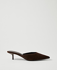 A brown suede pointed-toe mule heel sits against a plain, light gray background. carousel Product Image 1