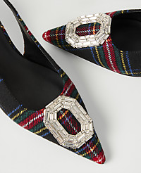 Two plaid pointed-toe heels with large crystal buckles are positioned against a plain white background. carousel Product Image 2