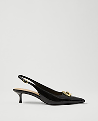 A black patent leather slingback heel with a gold buckle sits against a plain, light gray background. carousel Product Image 1
