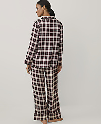A woman stands with her back to the camera wearing burgundy and white plaid pajamas against a plain white background. carousel Product Image 2