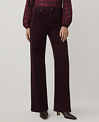 A person wearing a red plaid shirt and burgundy corduroy wide-leg trousers stands against a plain light gray background. carousel Product Image 2
