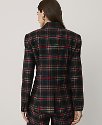 A woman stands with her back to the camera wearing a red, yellow, and blue plaid blazer and matching trousers against a plain light grey background. carousel Product Image 2