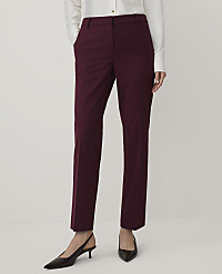 A person wearing a white shirt, burgundy trousers, and dark pointed-toe heels stands against a plain white background. carousel Product Image 1