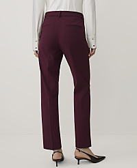 A person wearing a white shirt and burgundy trousers stands against a plain white background. carousel Product Image 2