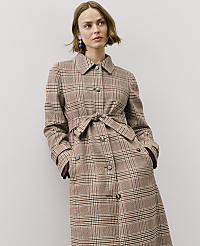 A woman wearing a brown plaid belted coat stands against a plain white background. carousel Product Image 4