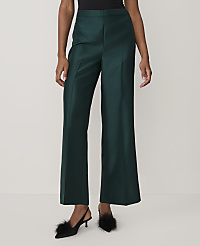 A person wearing dark green wide-leg trousers and black feathered heels stands against a plain white background. carousel Product Image 2