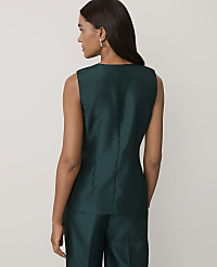 A woman wearing a dark green sleeveless top and matching trousers stands with her back to the camera against a plain light gray background. carousel Product Image 2