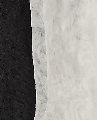 A black textured fabric stands in the foreground against a white textured fabric background. carousel Product Image 2