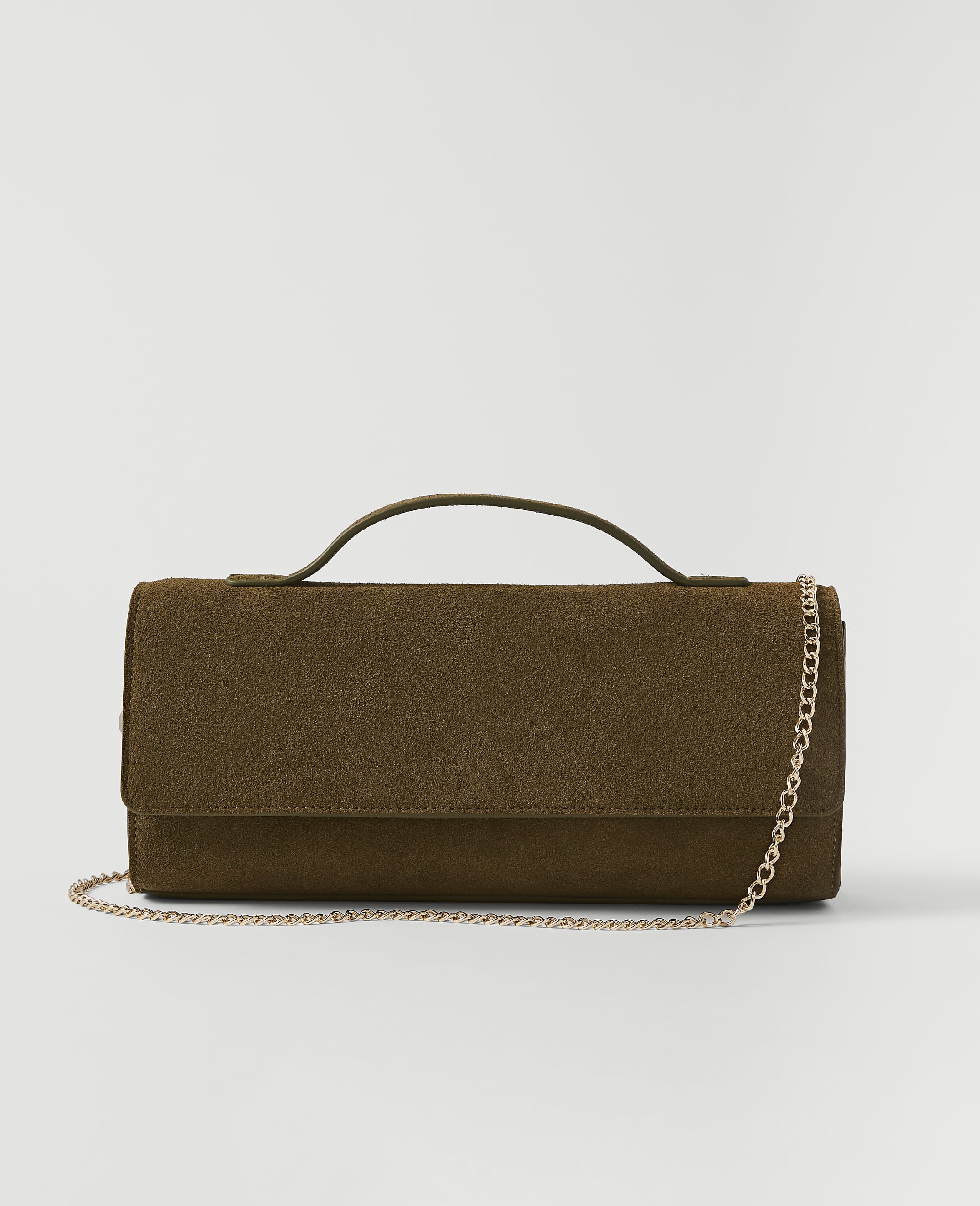 A textured olive green clutch with a top handle and a delicate gold chain rests against a plain, light gray background.