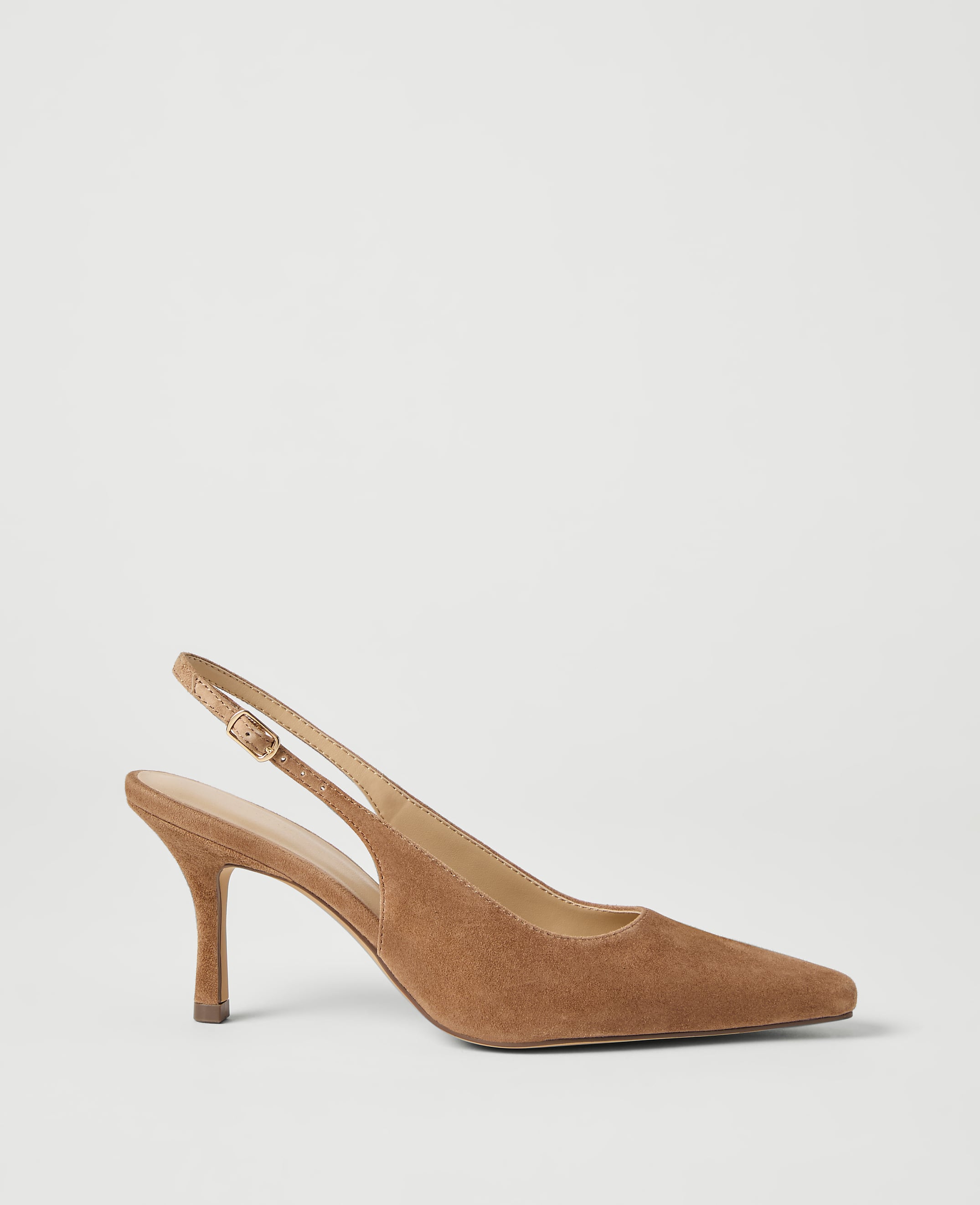 A tan suede slingback heel with a pointed toe rests on a plain white background.
