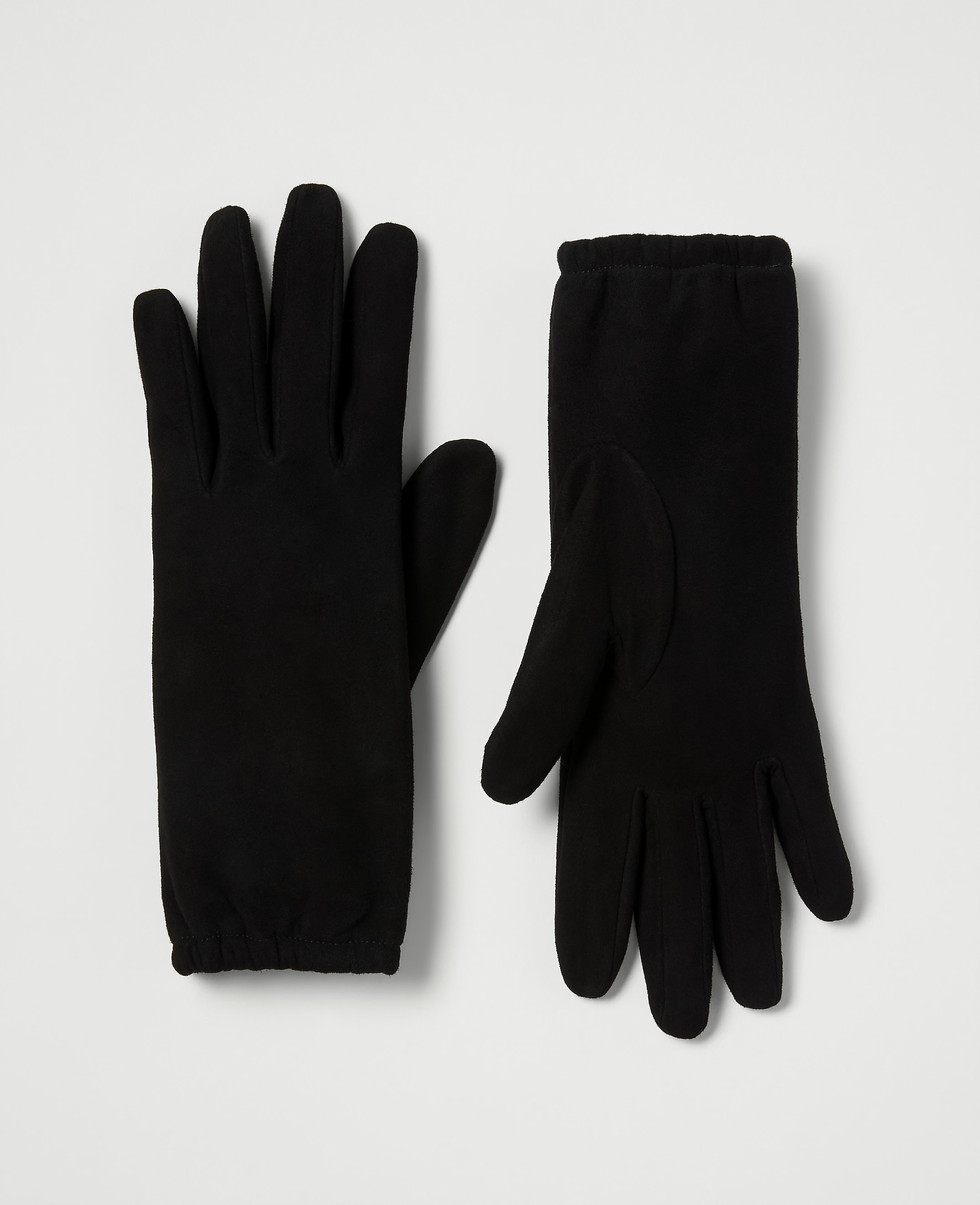 A pair of black fleece gloves lies flat on a plain white background.