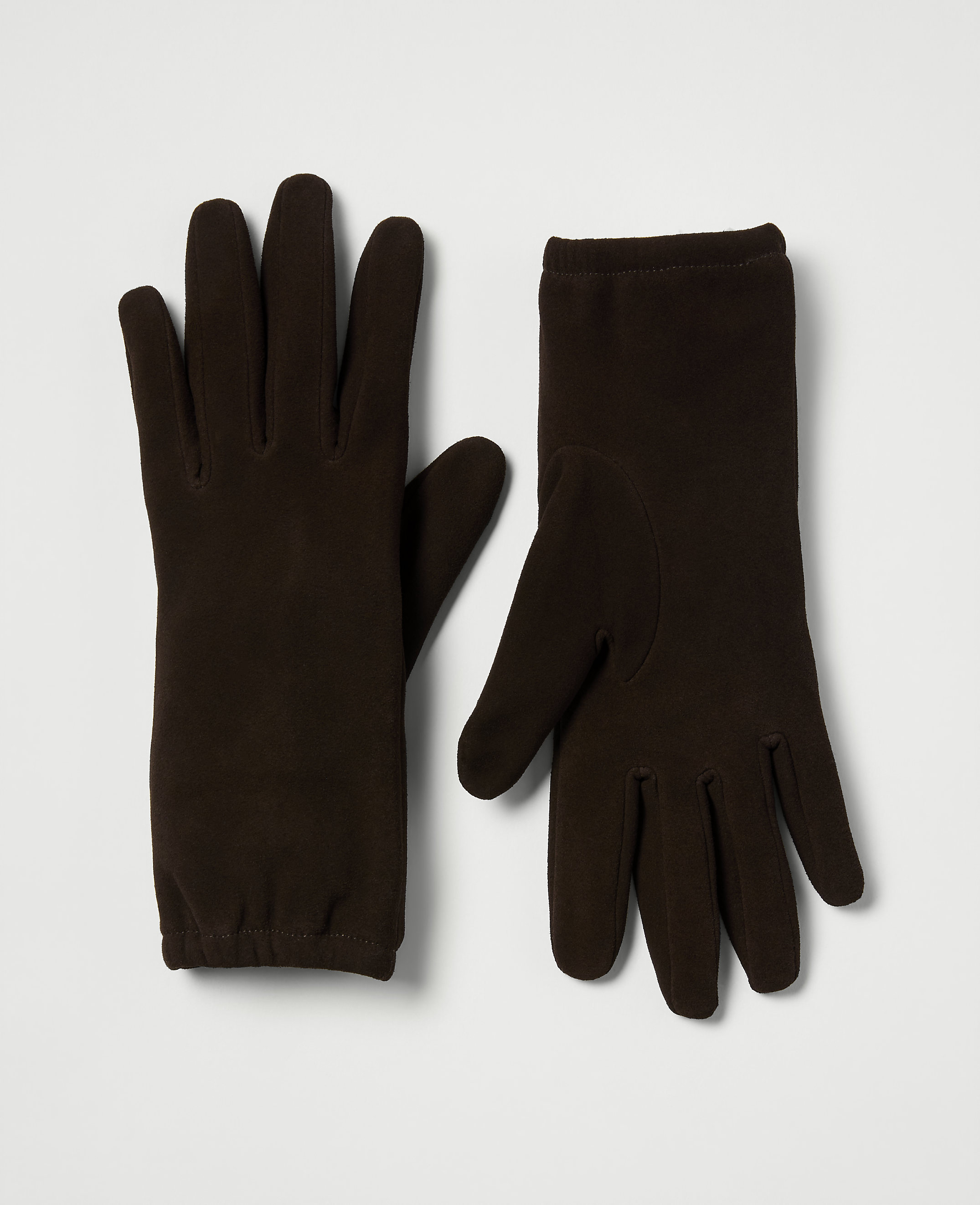 A pair of dark brown fleece gloves are laid out on a plain white background.