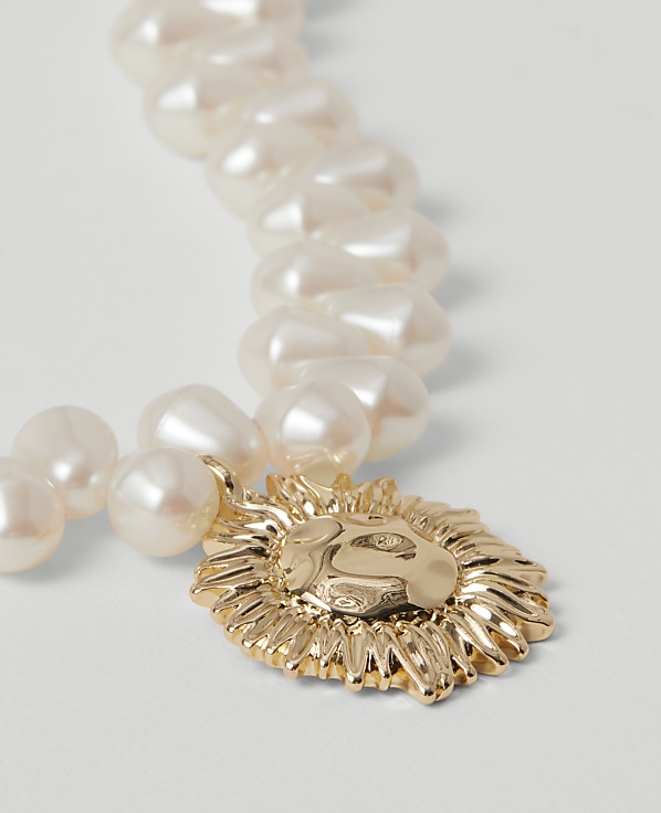 Pearlized Sun Pendant Necklace