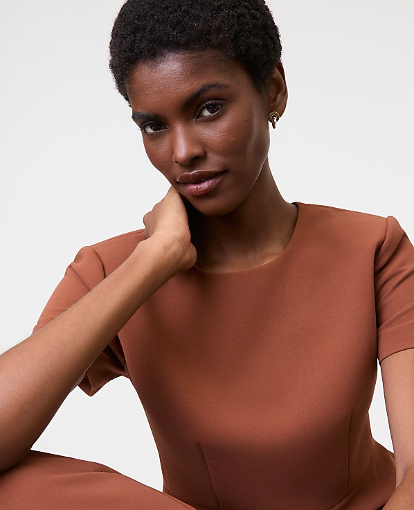 The Petite Crew Neck Peplum Top in Textured Crepe