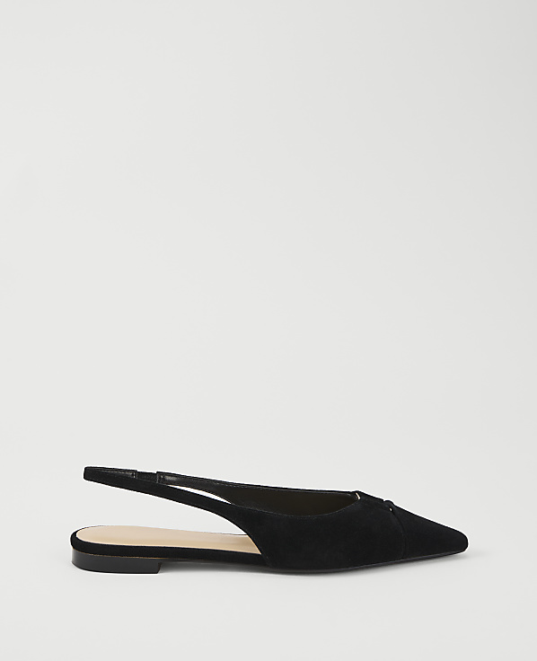 A black suede slingback flat with a pointed toe sits on a plain white background.