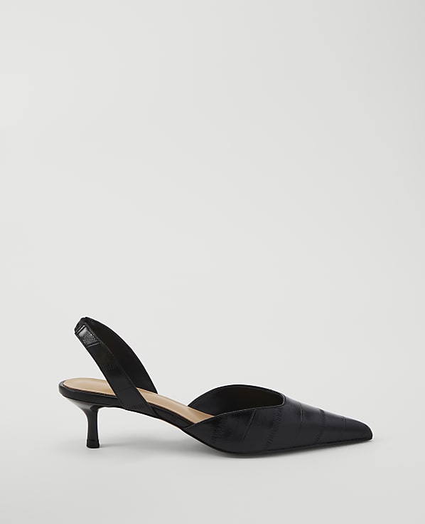 A black croc-embossed slingback heel with a pointed toe rests on a plain white background.