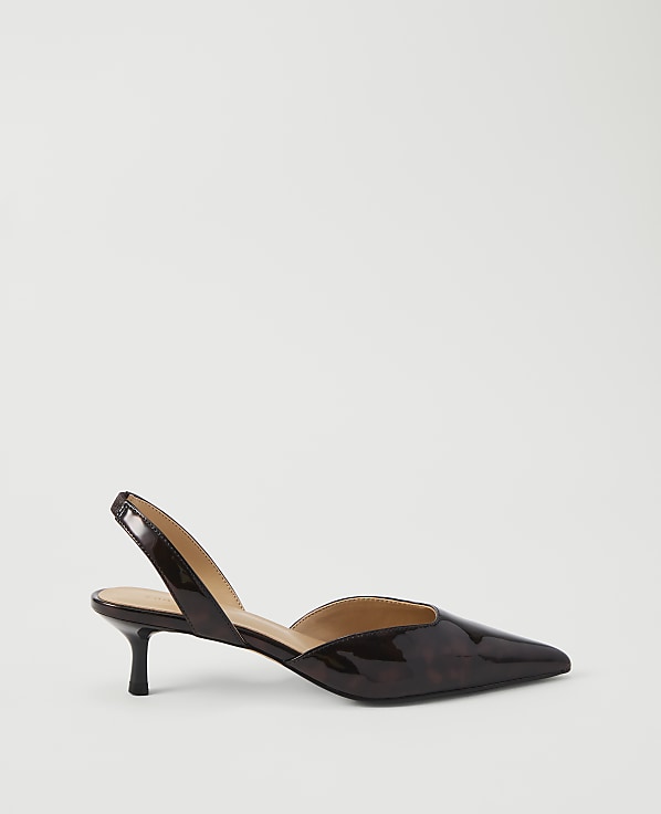 A glossy, tortoiseshell slingback heel rests on a plain white background.