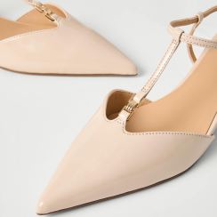 Ivory pointed-toe T-strap heels