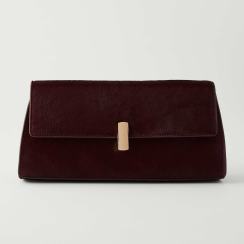 Burgundy suede clutch with gold clasp
