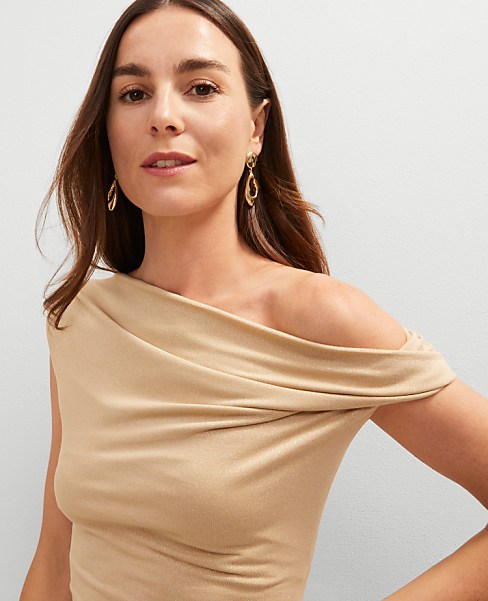 Metallic Asymmetric Top