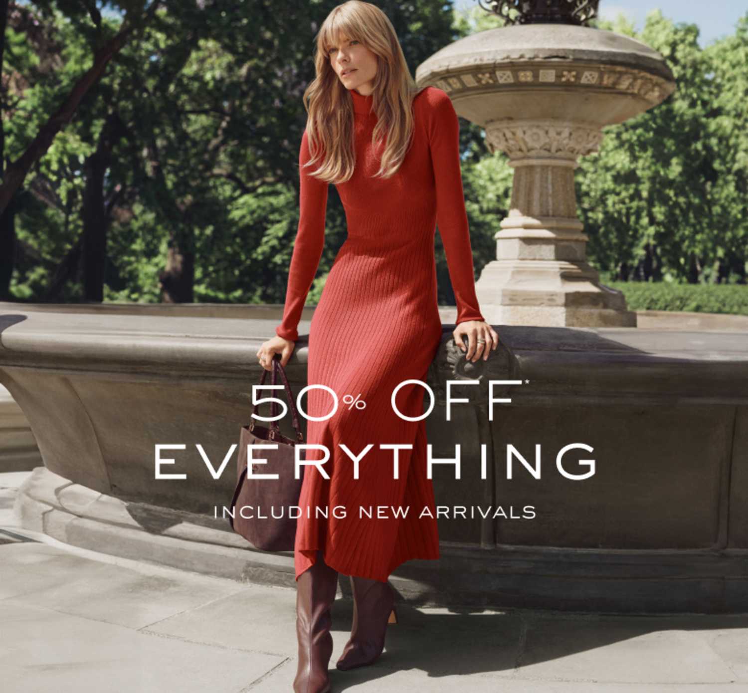 50% off everything, including new arrivals. Woman in a red ribbed-knit midi dress and burgundy boots.